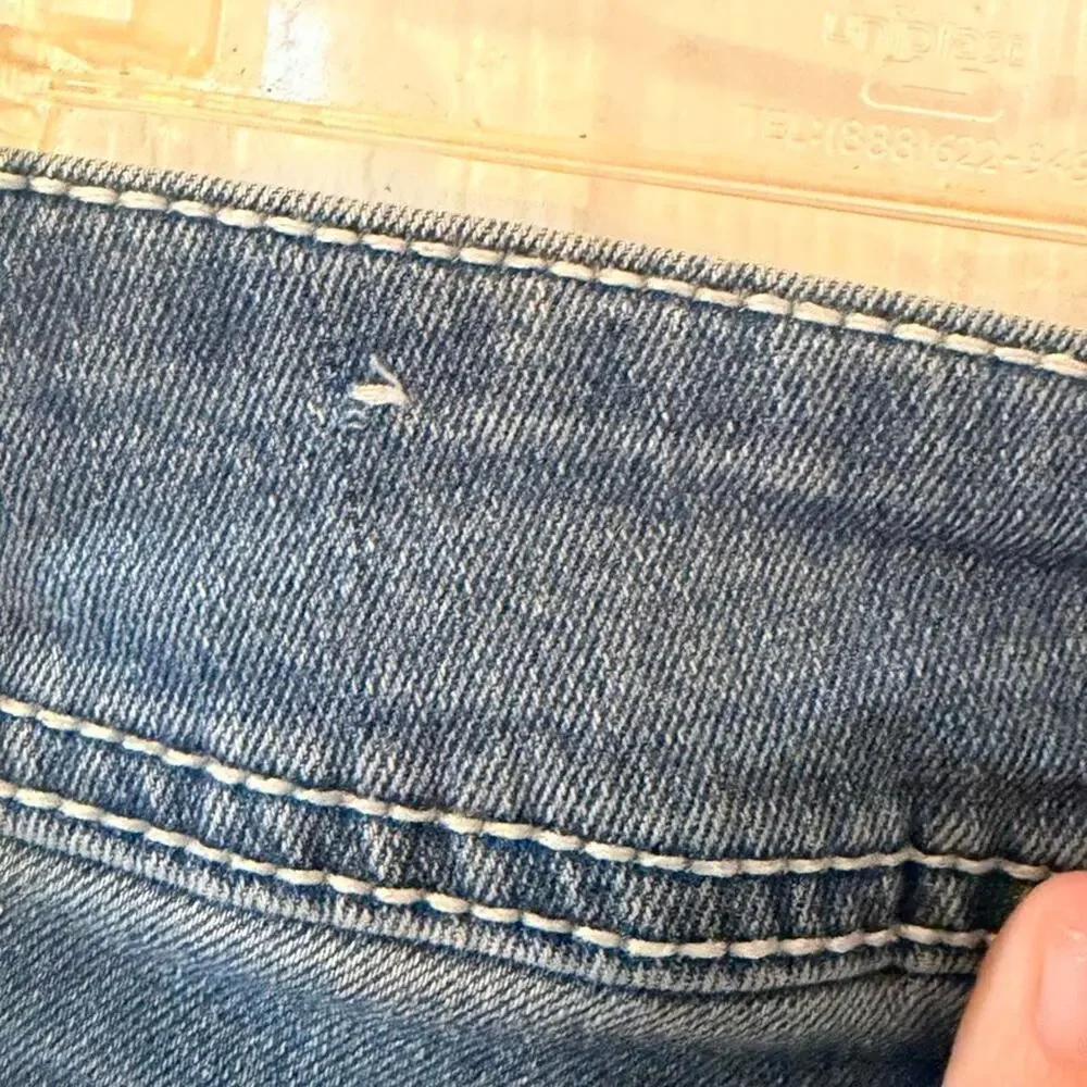 Gemma Rae Y2k blue ripped bootcut with stitch and rhinestone back pocket- 3/26